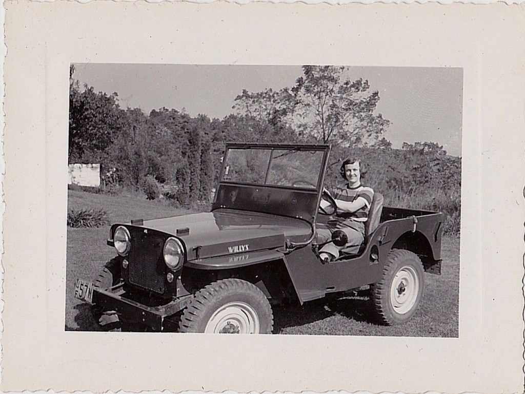 A woman in jeep.