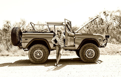 A girl and a Ford Bronco.
