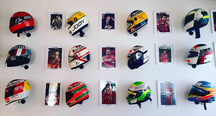 The interior decorations mushroomed to include original helmets from greats like Schumacher and V12 engines from Ferrari road and road cars alike.