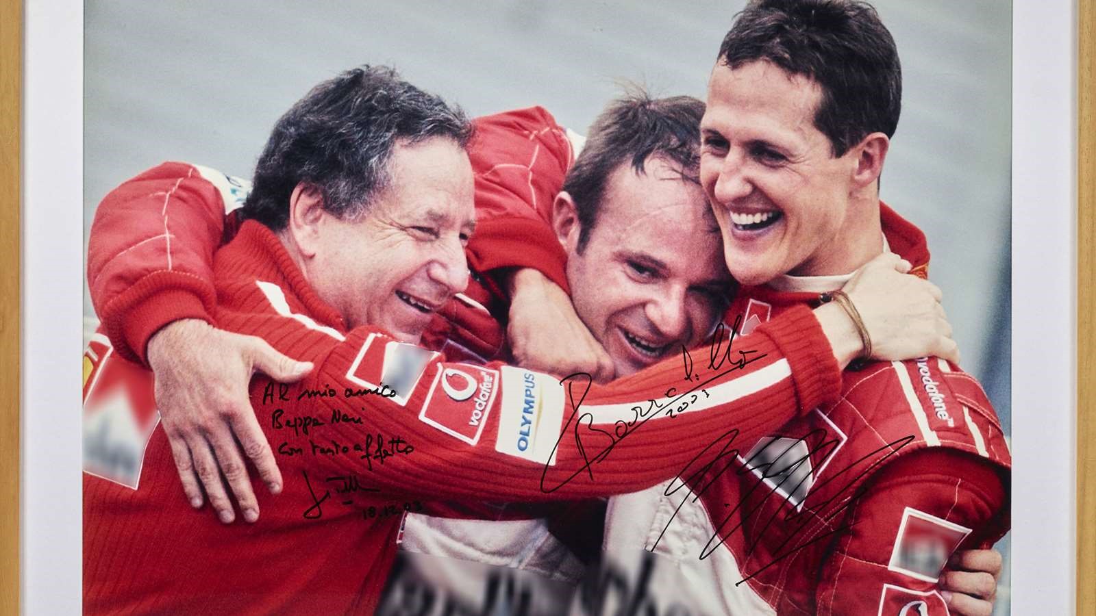 A painting with Jean Todt, Rubens Barrichello and Michael Schumacher.