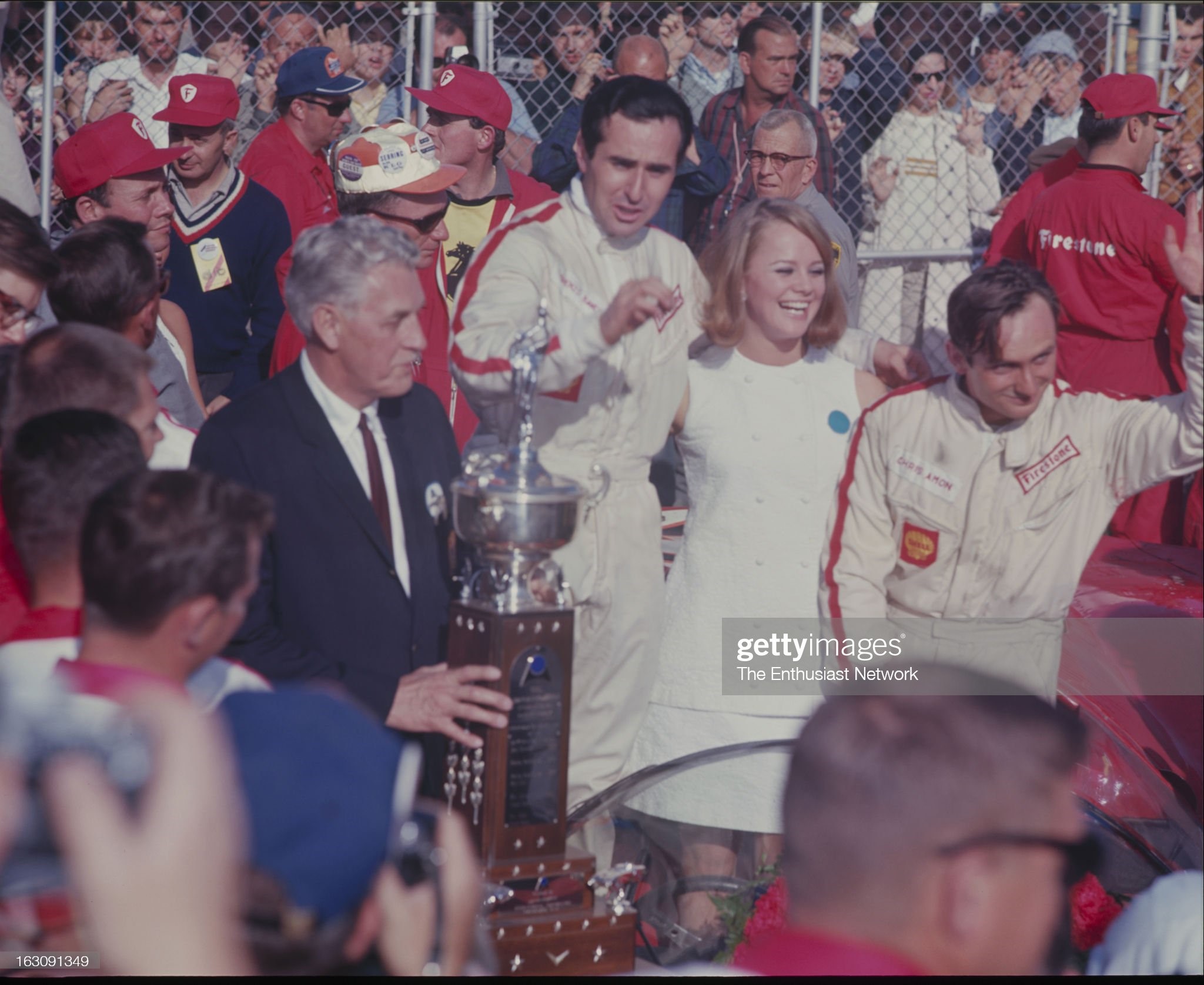 United States, February 05, 1967, Daytona 24-Hour Race. Race winners Chris Amon and Lorenzo Bandini of Ferrari celebrate their victory. 