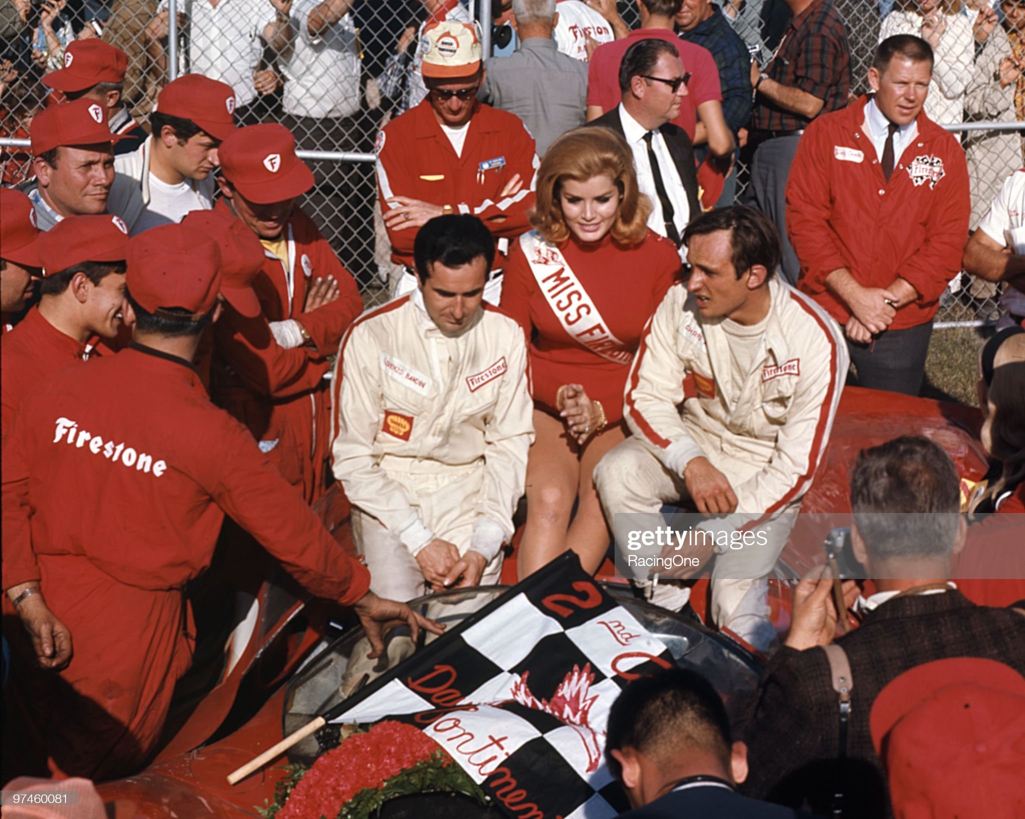 Daytona Beach, Florida, February 05 1967. Lorenzo Bandini (left) and Chris Amon won the Daytona 24 in a Ferrari 330 P4. The trophy queen is Winkie Louise. 