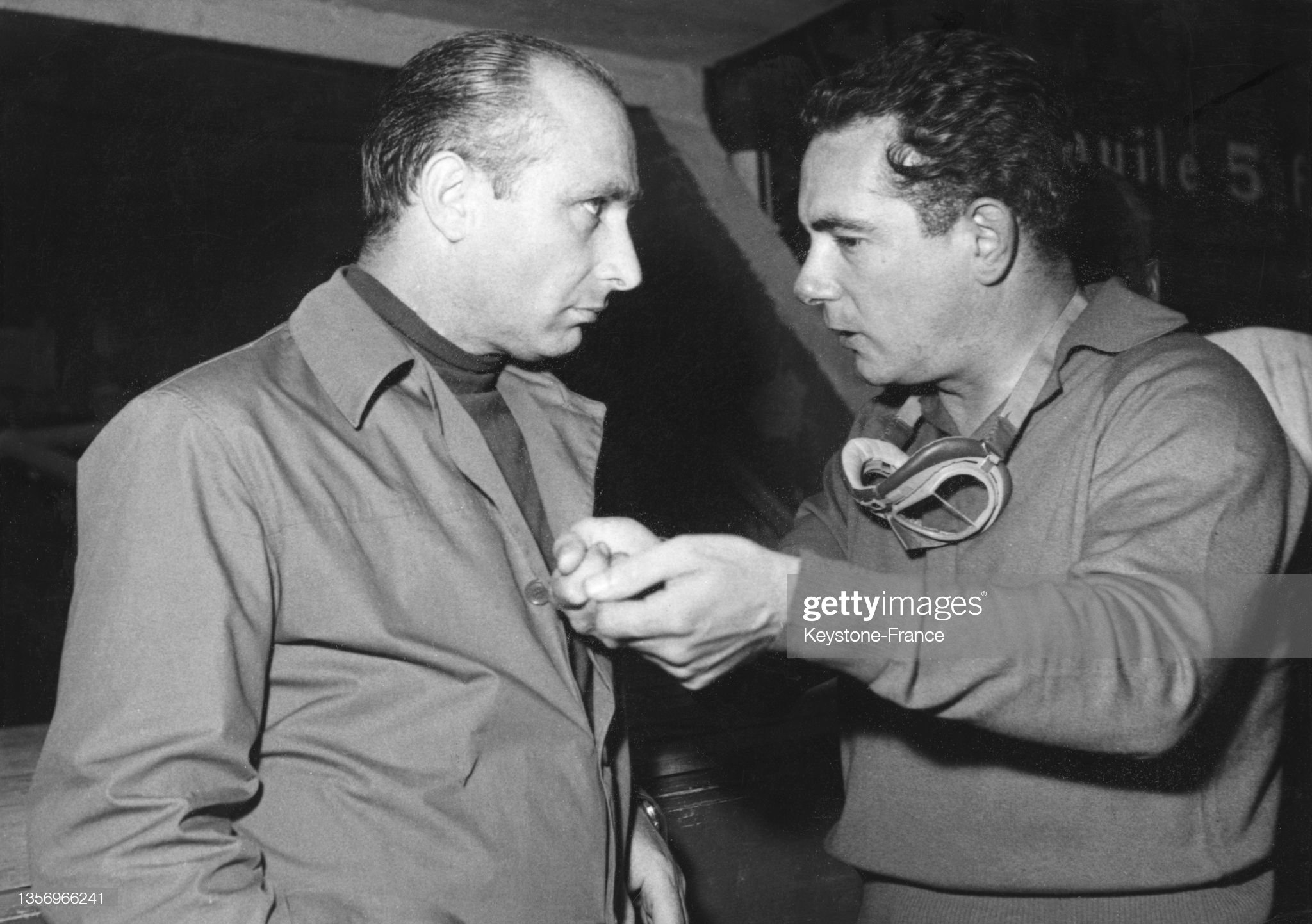 Juan Manuel Fangio and Jean Behra.