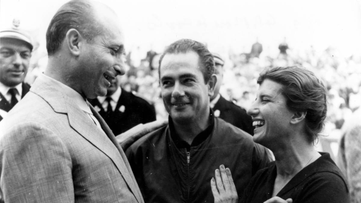 Juan Manuel Fangio, Jean Behra and Maria Teresa de Filippis at the 1959 Monaco Grand Prix. 