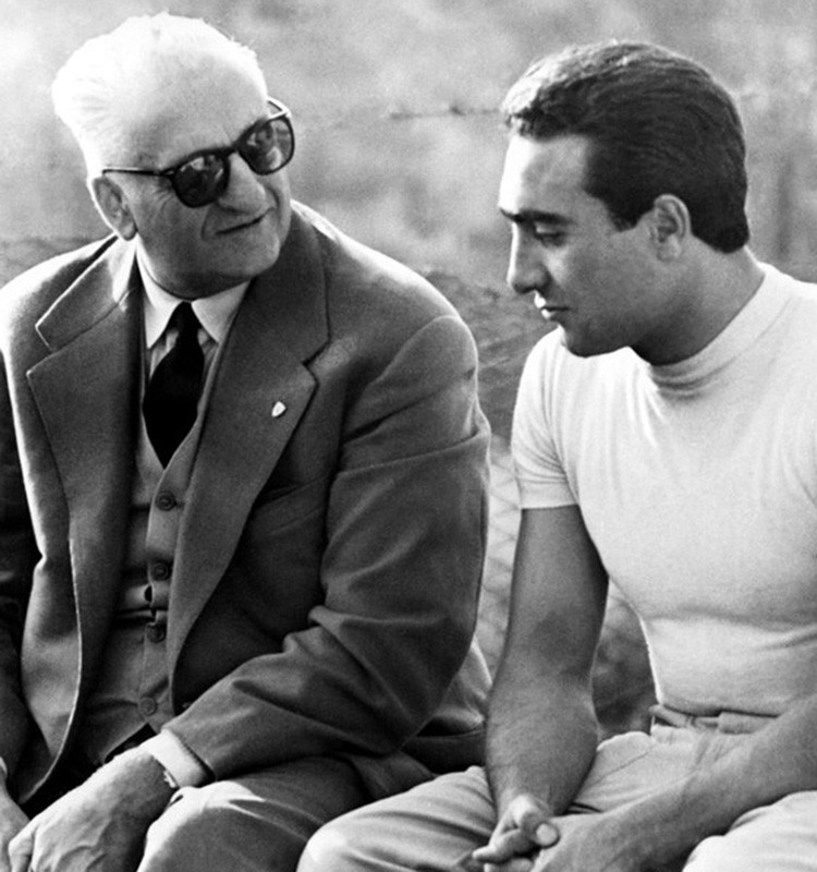 Eugenio Castellotti with Enzo Ferrari in 1957.