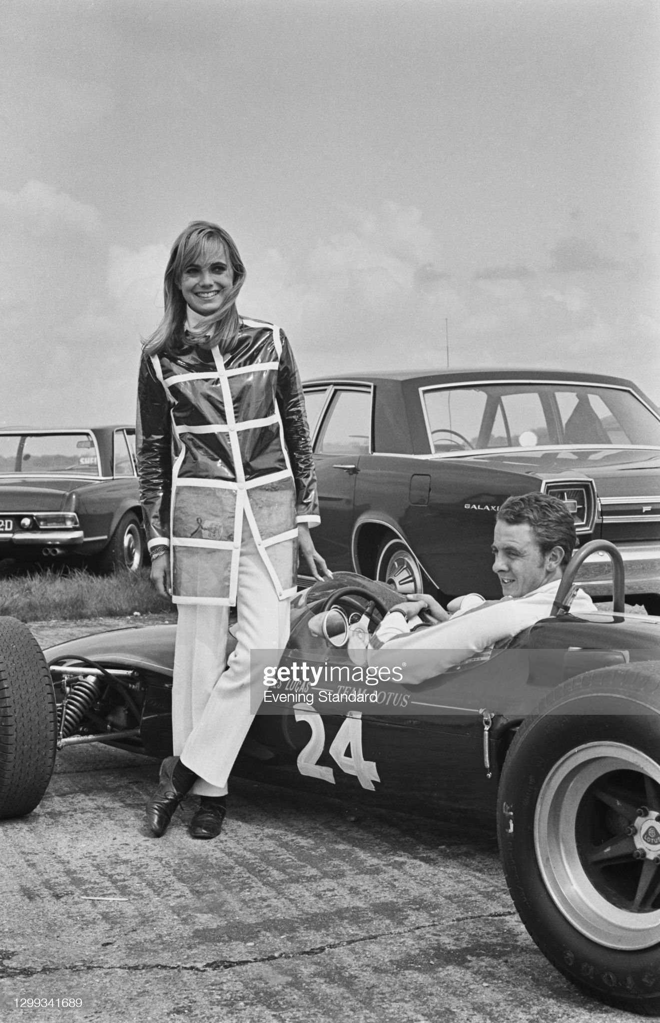 Piers Courage with his wife Lady Sarah Curzon, before the Radio London Trophy race at Silverstone, UK, 13th May 1966. Courage is driving a Charles Lucas Team Lotus Lotus 41 Ford Cosworth. 