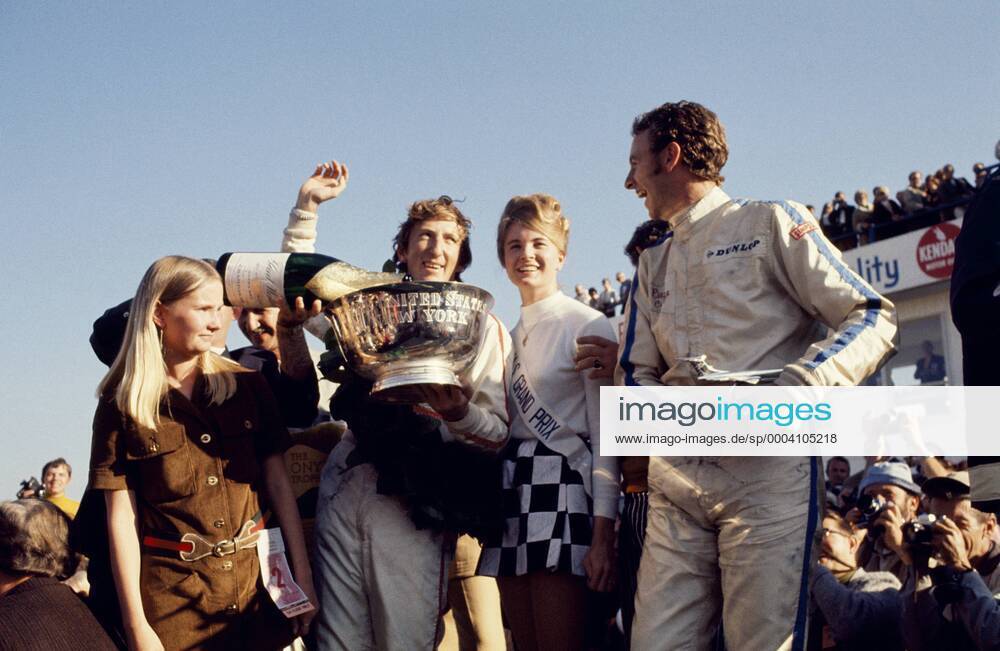Award ceremony in Watkins Glen on October 05, 1969: winner Jochen Rindt, Lotus Ford and Piers Courage, Brabham Ford.