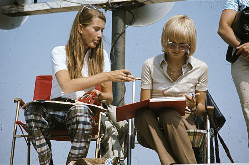 Nina Rindt shows Sally Courage the correct way to fill in a lap chart. 