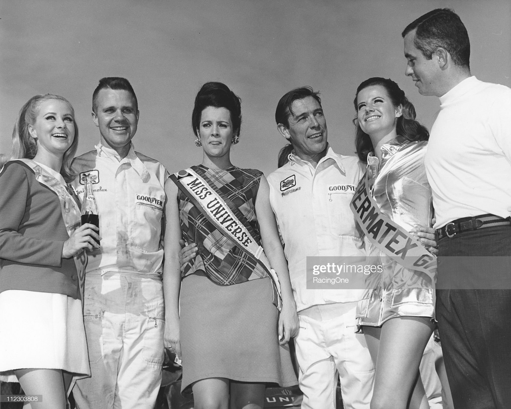 Daytona Beach, Florida, February 02, 1969. Drivers Mark Donohue and Chuck Parsons are joined in victory lane by car owner Roger Penske and three of the race queens.