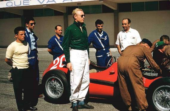 Mike Hawthotn beside his Ferrari.