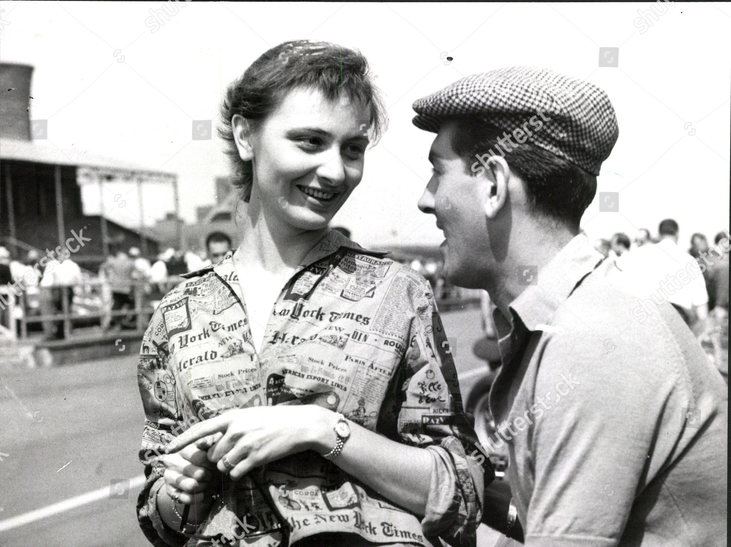 Luigi Musso with his fiancee Fiamma Breschi at Aintree for the British Grand Prix. 