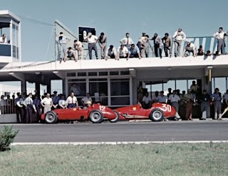 The pit lane at the Argentine Grand Prix of 1956 in which Musso, whose car is n. 12, gained his only F1 win.