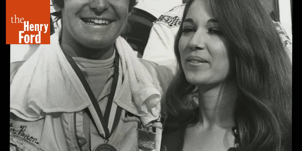 Peter Revson with a brunette girl.