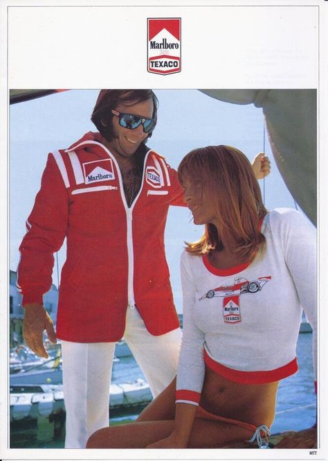 Emerson Fittipaldi with a girl.