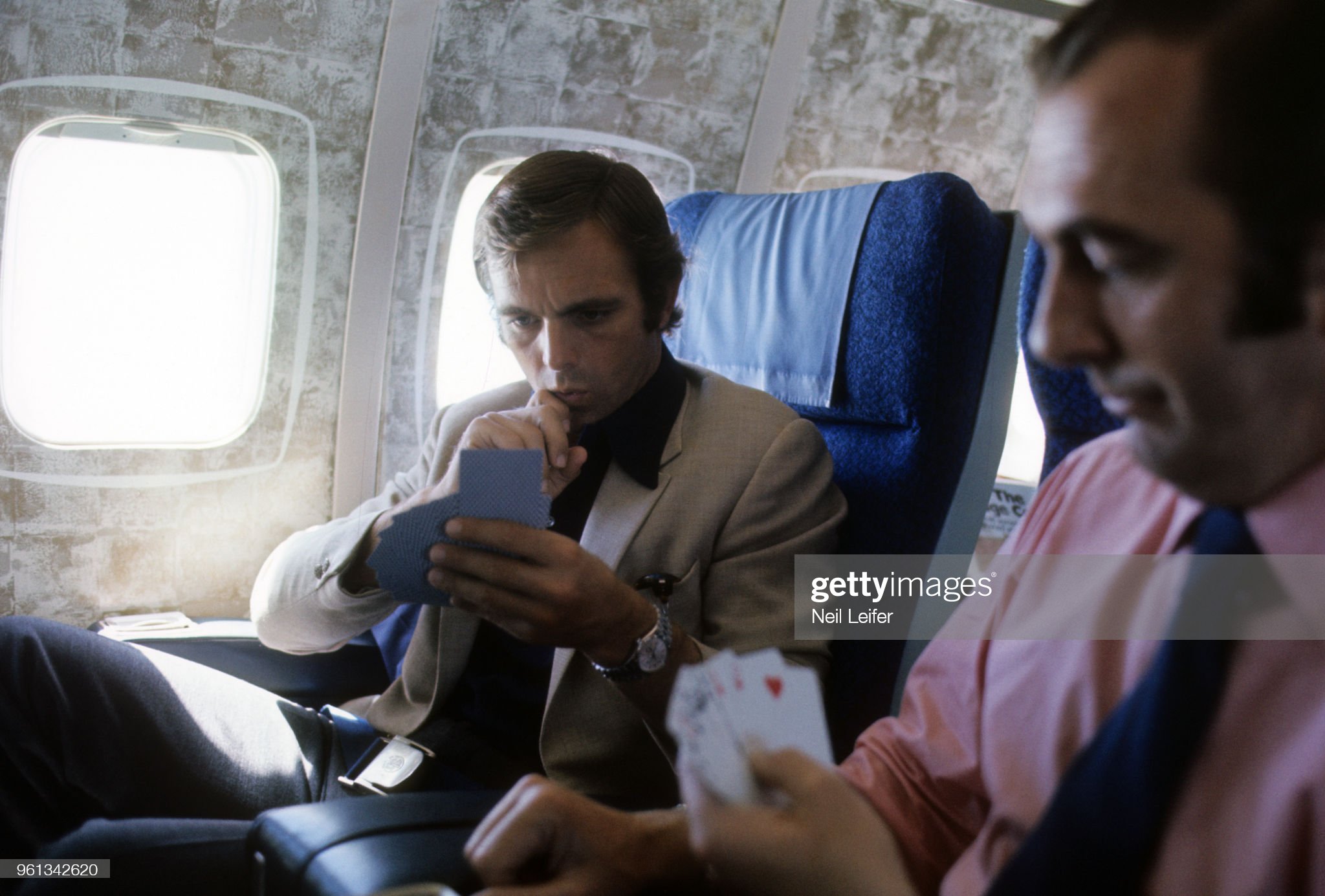 Yardley McLaren Peter Revson playing cards on a plane before Circuit de Monaco on June 03, 1973. 
