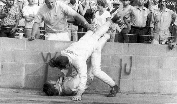 That's Sam Posey on the ground and the late Peter Revson pummeling Sam. 