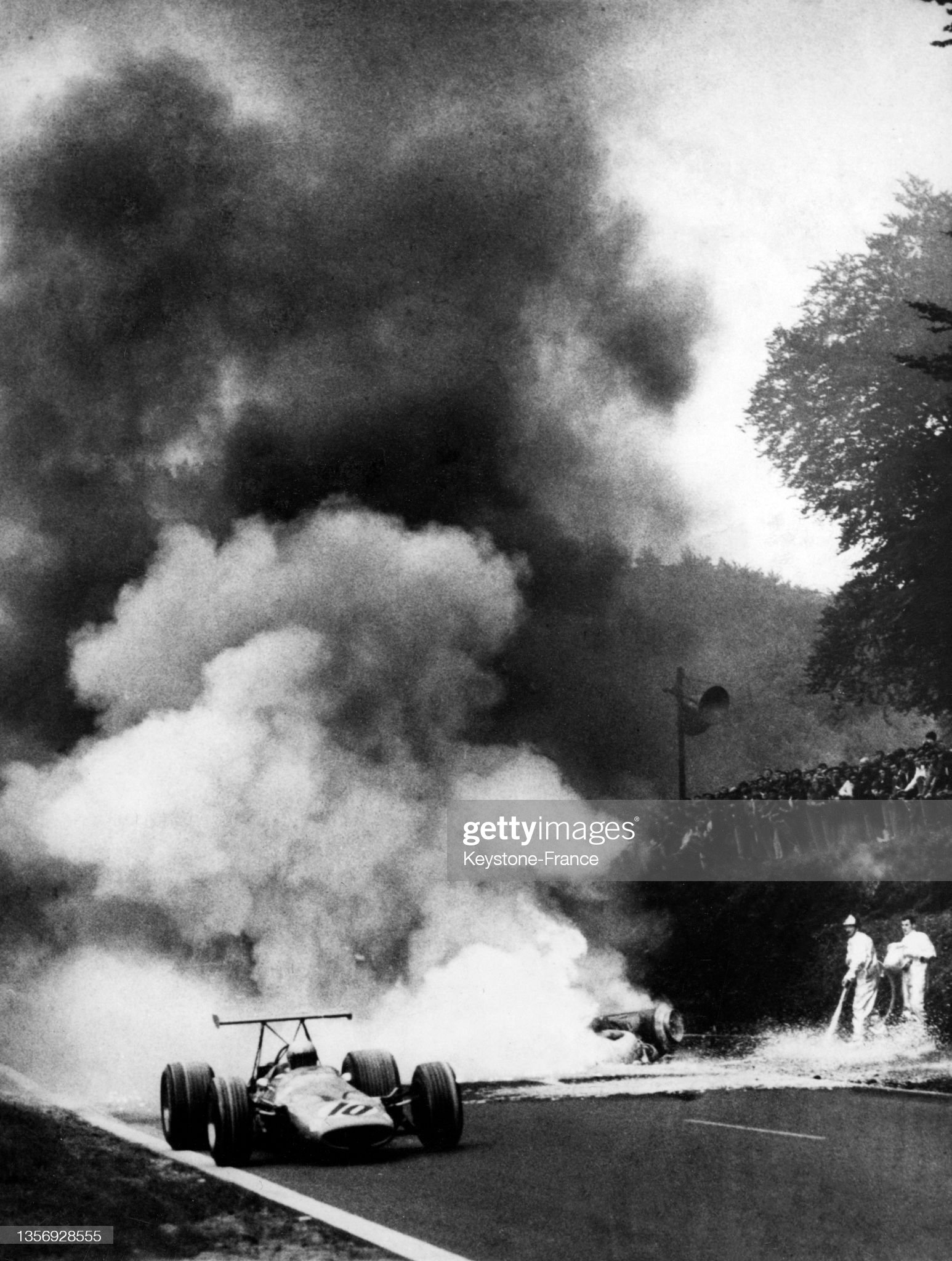 Jo Schlesser's car in flames during his fatal accident.