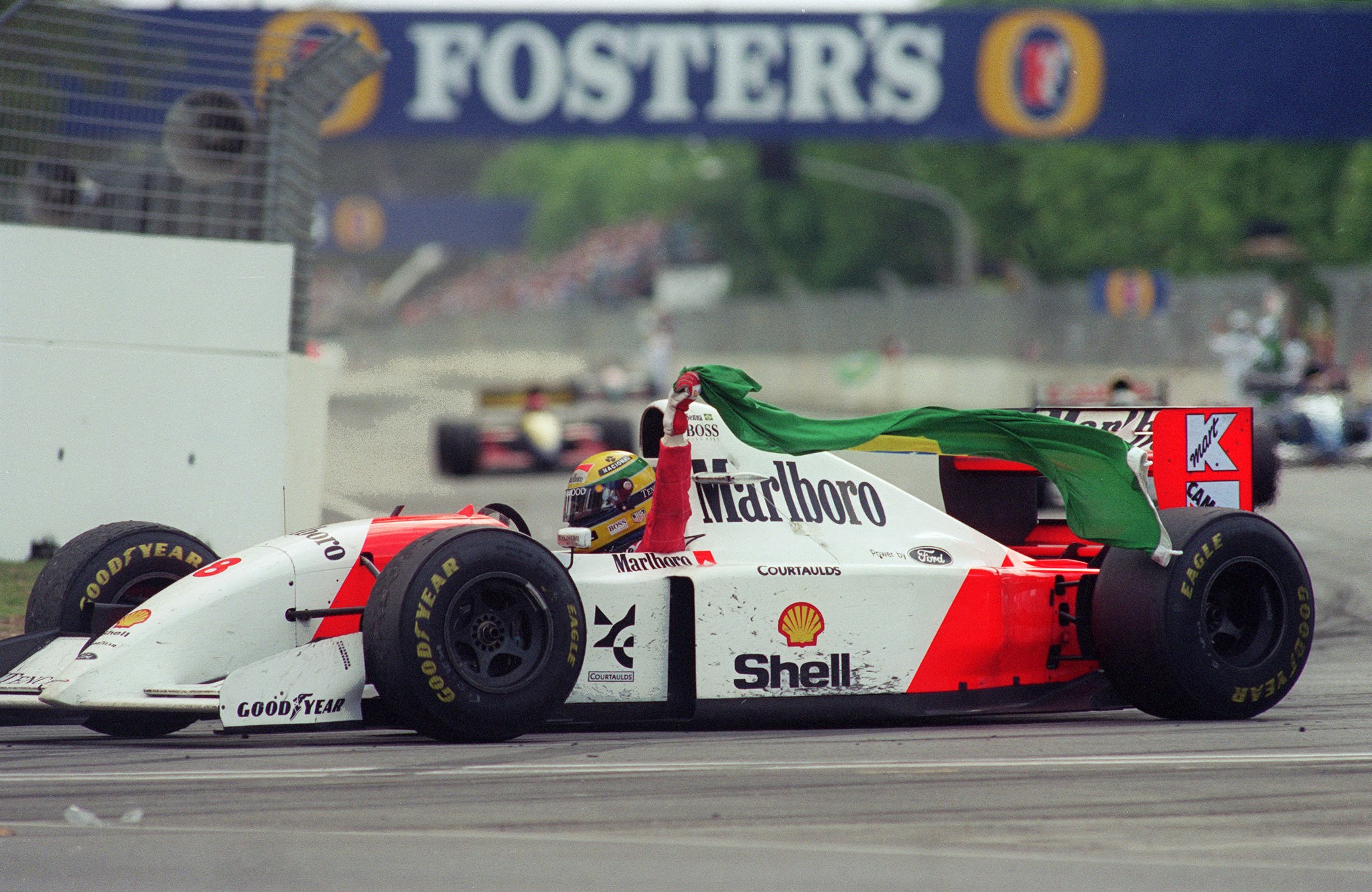 Ayrton Senna in a McLaren.