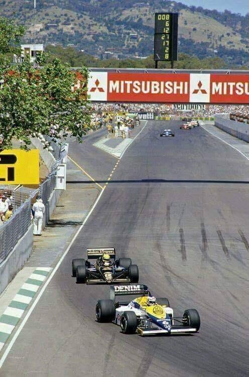 Ayrton Senna, Lotus, following Keke Rosberg, Williams.