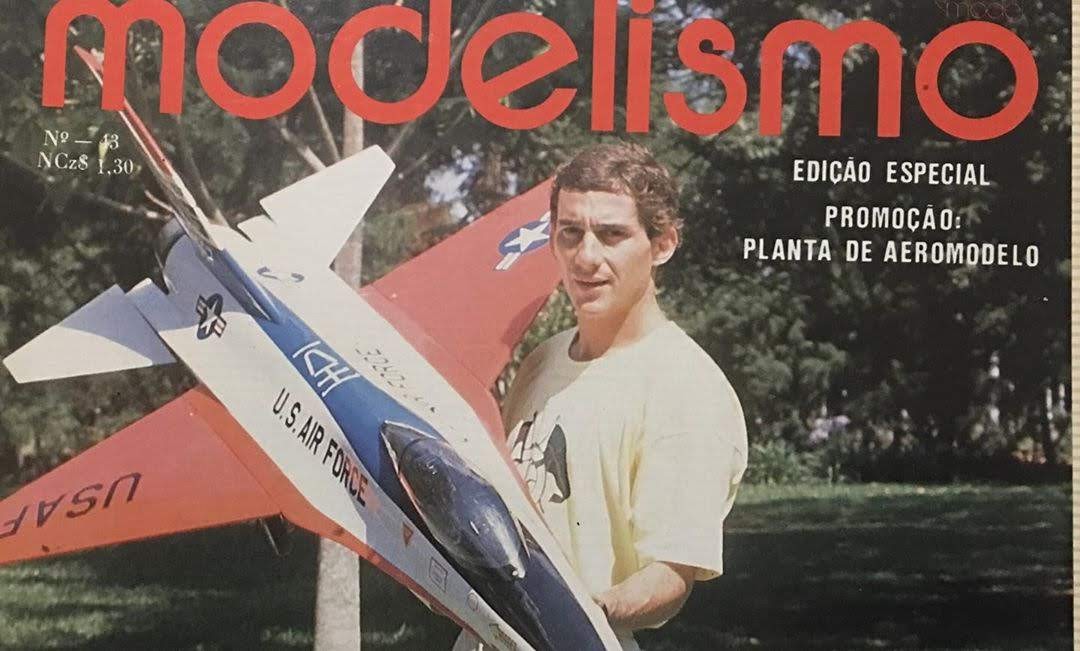 Ayrton Senna with a model plane on a magazine.