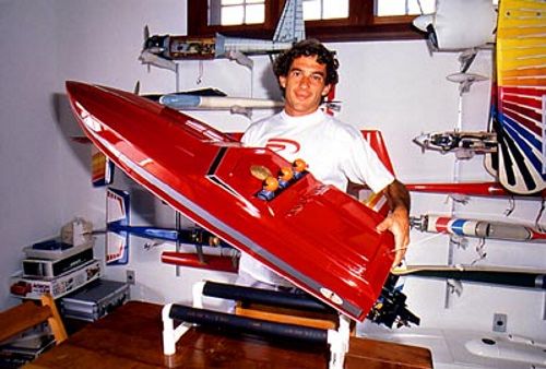 Ayrton Senna with a model boat.
