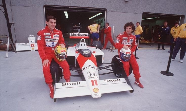 Ayrton Senna and Alain Prost in the McLaren pits.