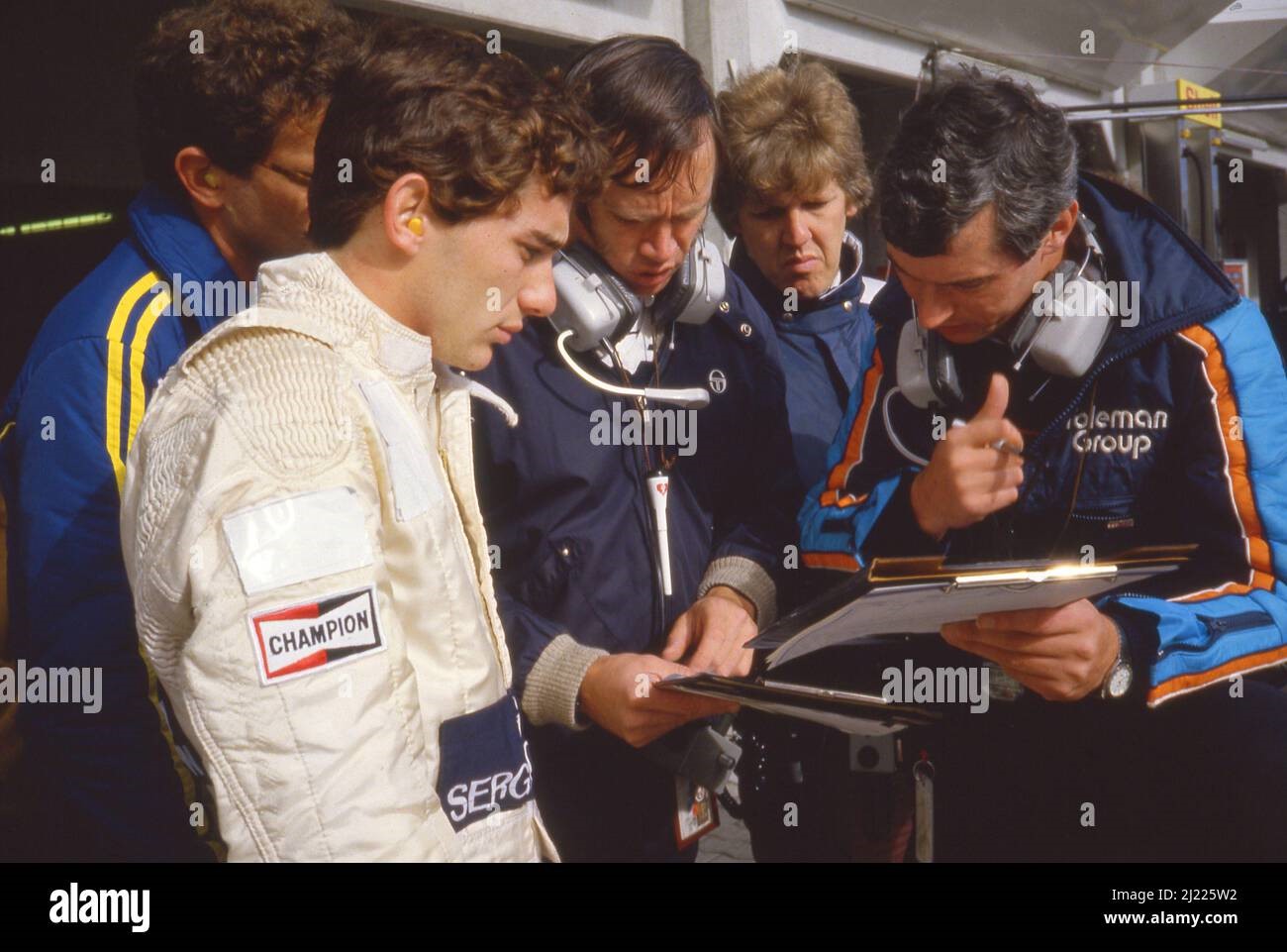 Ayrton Senna, Toleman-TG-184-Hart, talks with Pat Symonds and Rory Byrne.