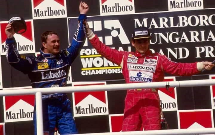 Nigel Mansell and Ayrton Senna on the podium.