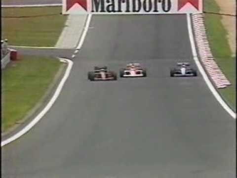 Nigel Mansell, Ferrari, overtaking Ayrton Senna, McLaren.