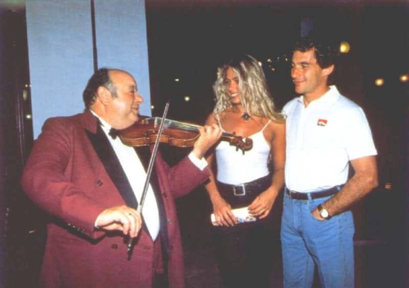 Ayrton Senna with a blonde girl.
