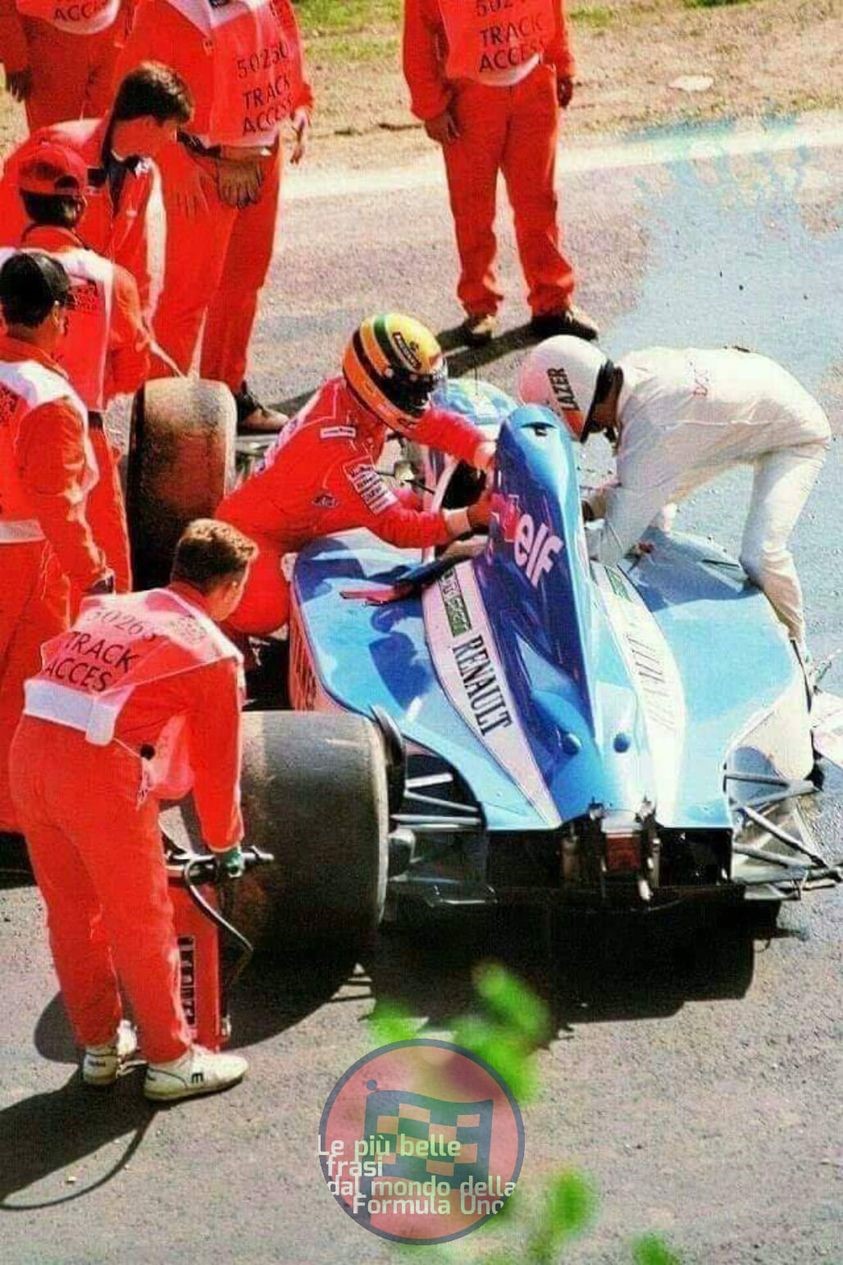 Ayrton Senna lending aid to Eric Comas.