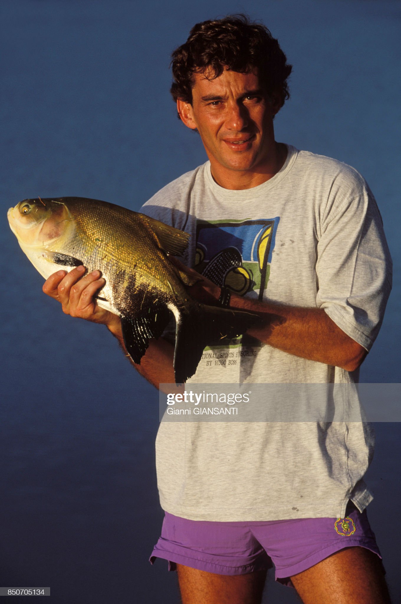 Ayrton Senna with a fish.
