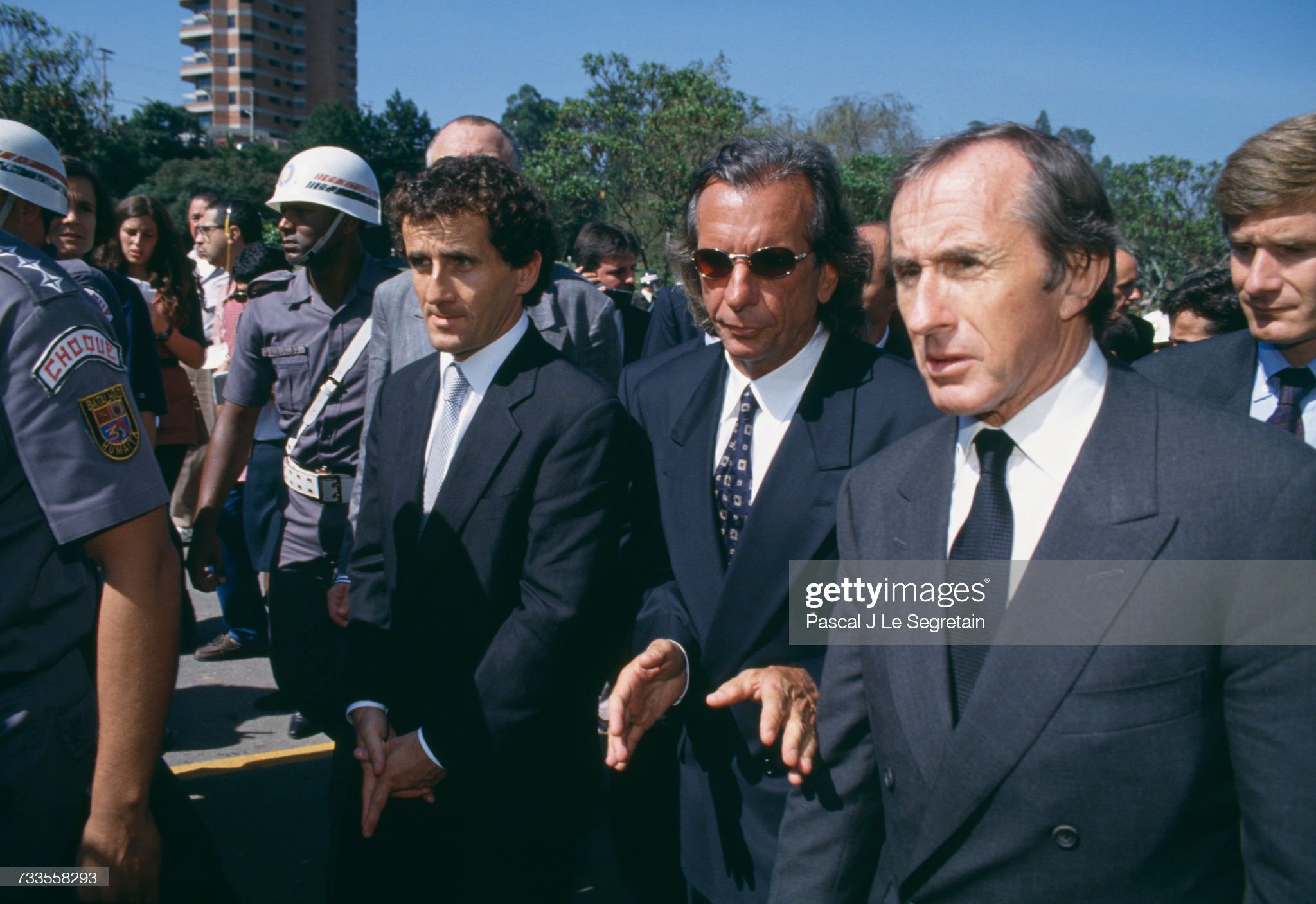 Alain Prost, Emerson Fittipaldi and Jackie Stewart at the funeral of Ayrton Senna. 