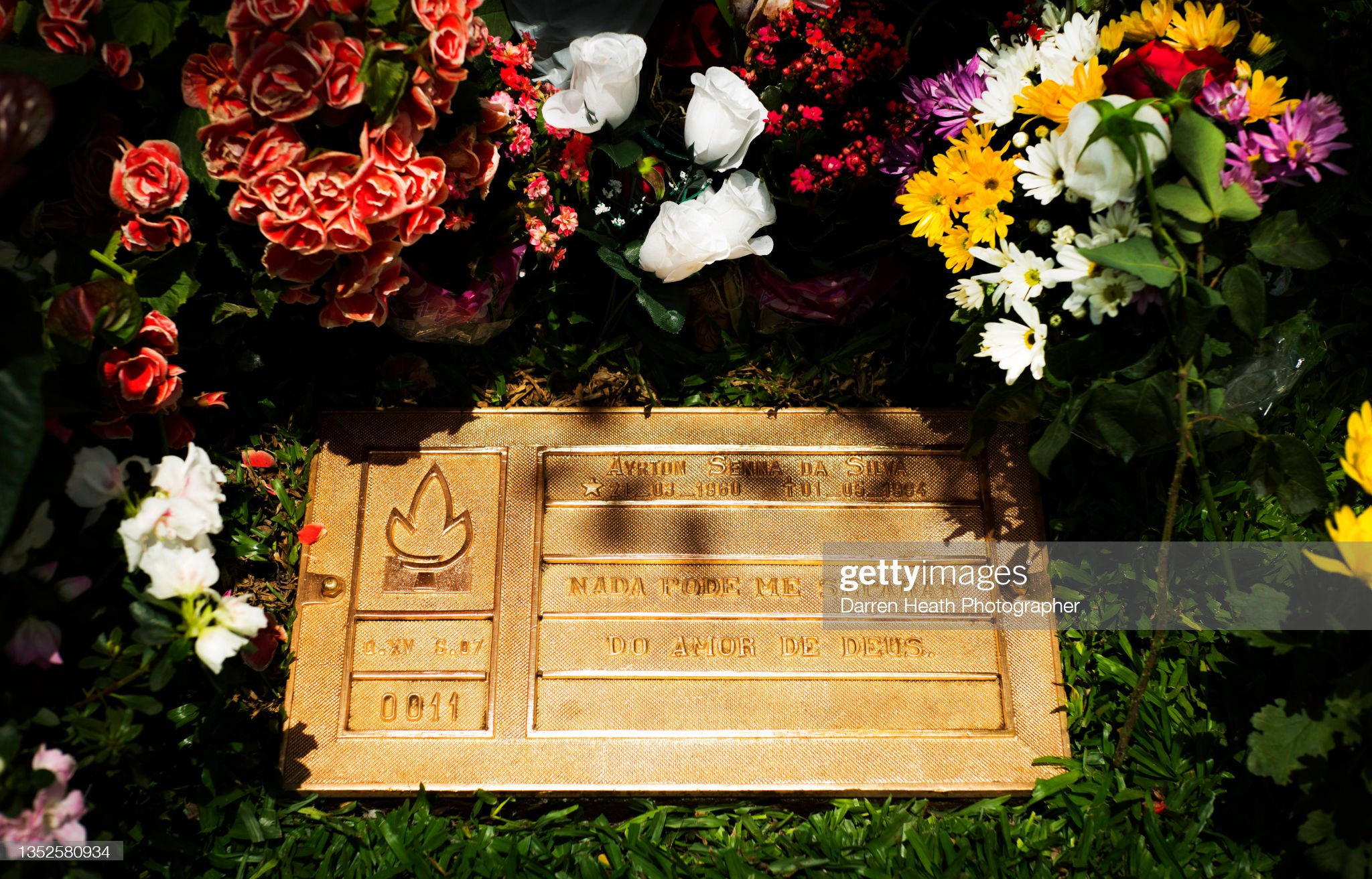 The plaque positioned on the grave of Ayrton Senna surrounded by flowers in the Morumbi Cemetry during the weekend of the Brazilian Grand Prix, Autódromo José Carlos Pace, São Paulo, Brazil, on the 21st November 2013.