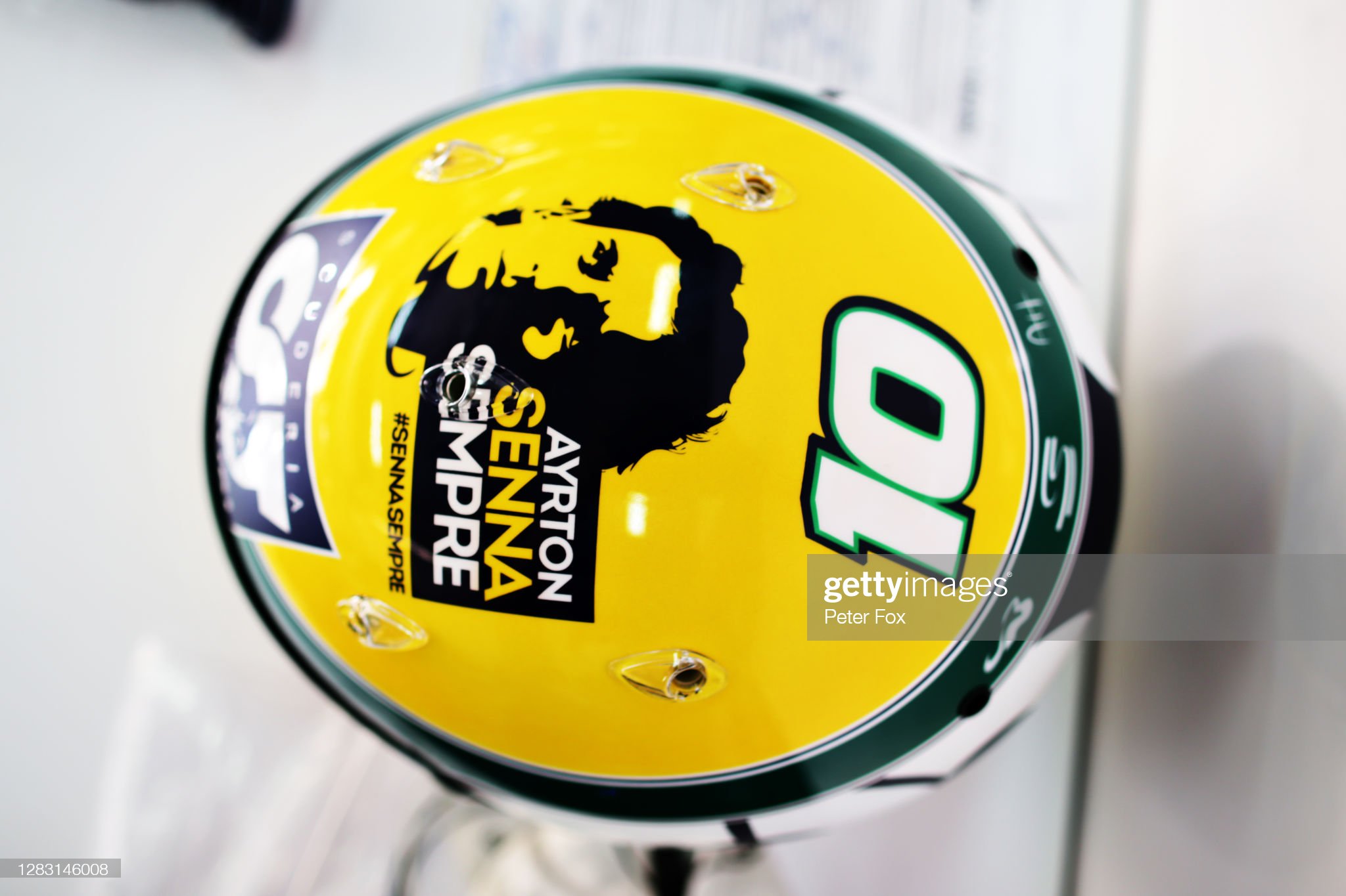 A detail shot of the Ayrton Senna inspired helmet of Pierre Gasly of France and Scuderia Alpha Tauri is pictured in the garage during practice ahead of the F1 Grand Prix of Emilia Romagna at Autodromo Enzo e Dino Ferrari on October 31, 2020 in Imola, Italy.