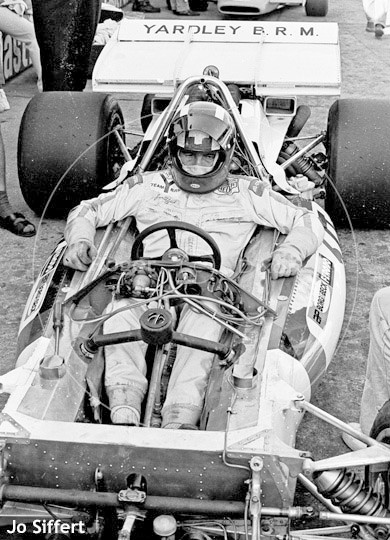 Jo Siffert in a race car.
