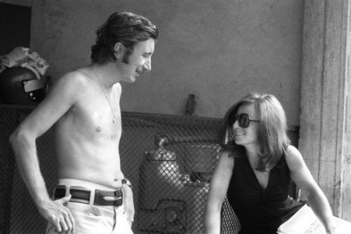 Jo Siffert strips off again, to the pleasure of a watching lady. 
