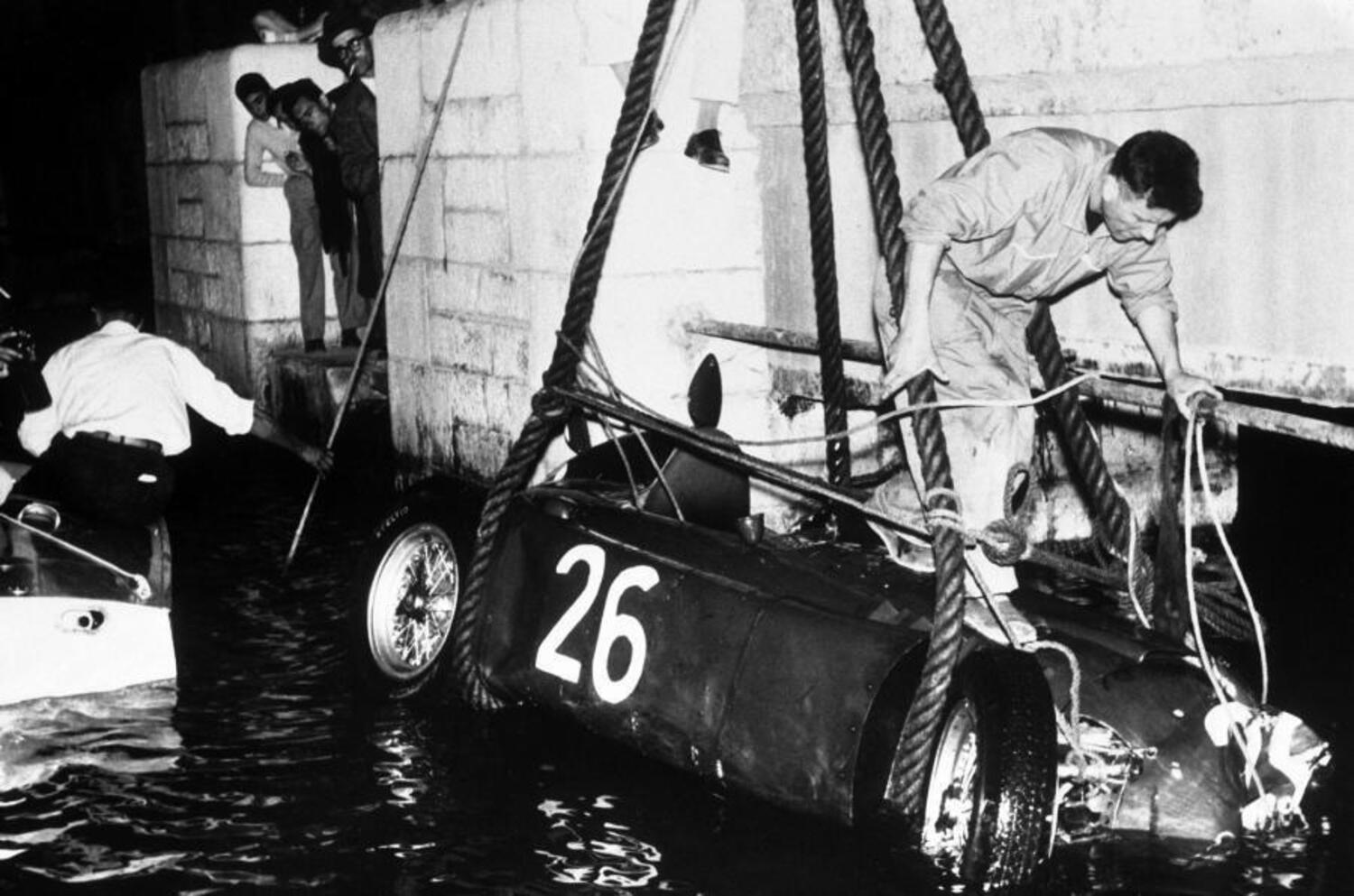 Alberto Ascari's Lancia recovered from the waters of the port of Monte Carlo.