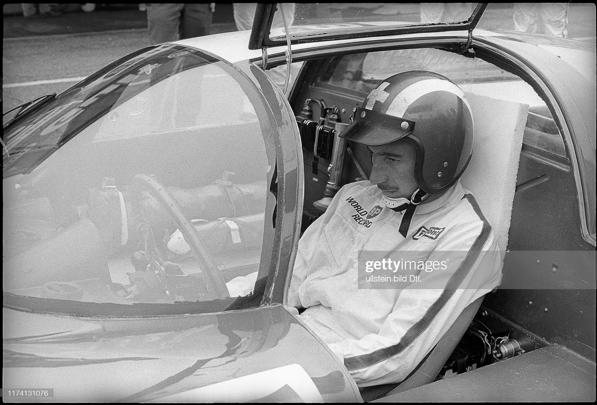 Jo Siffert sitting in a Porsche 906 setting a world record in Monza on October 29, 1967.