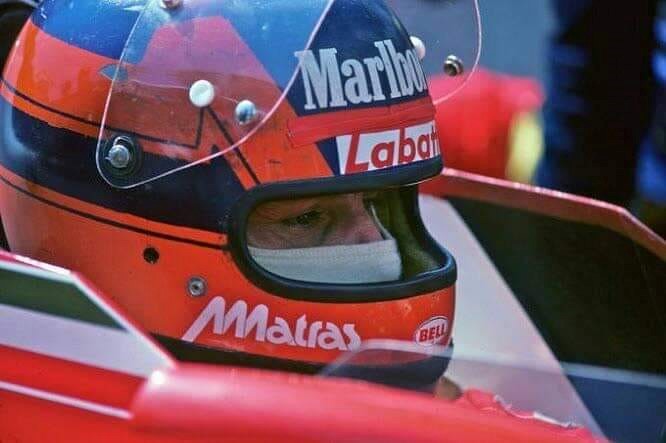 Gilles Villeneuve in a Ferrari.