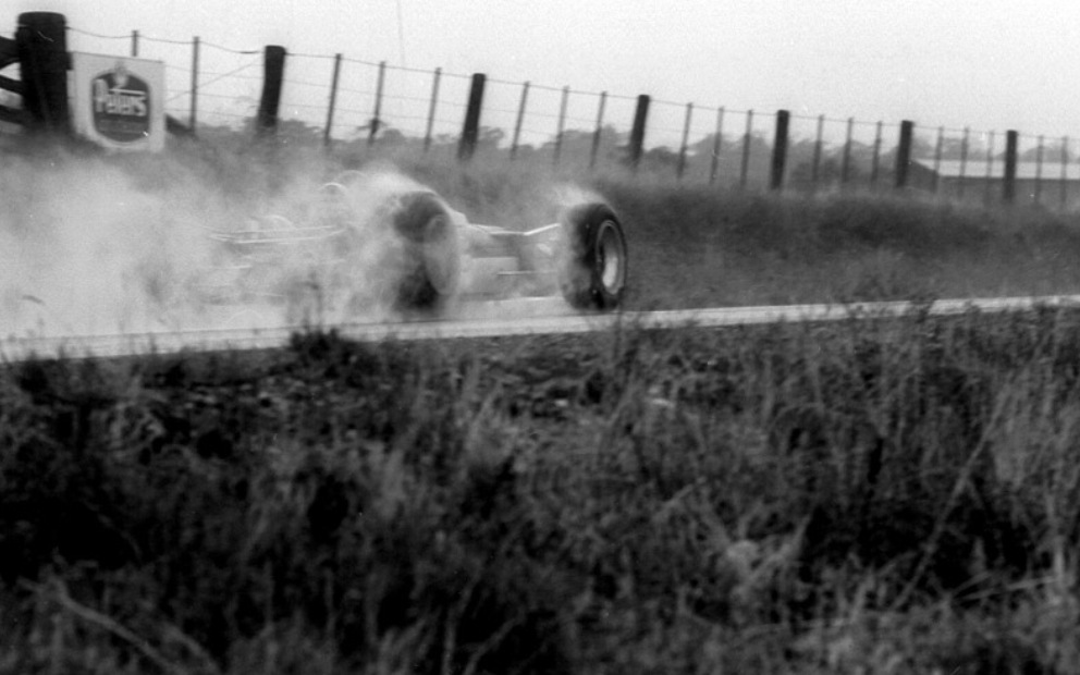 Jim Clark, Lotus 49, racing in the rain.