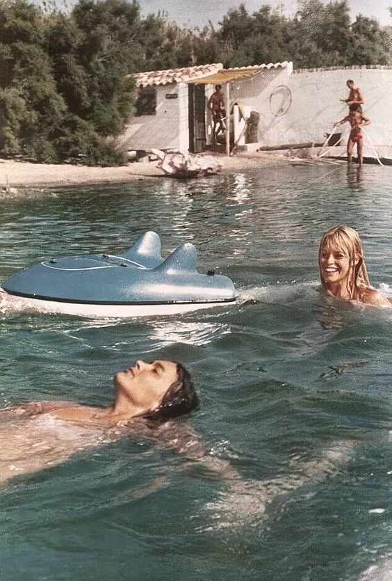 Brigitte Bardot with a friend.