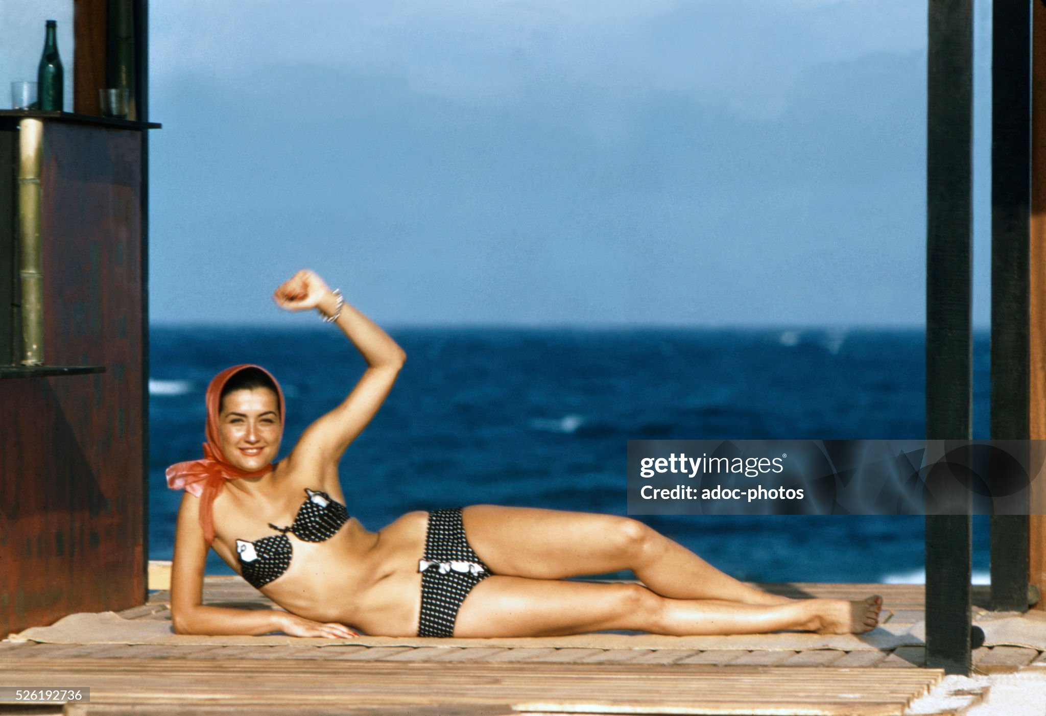 A woman in a bikini on the beach of Saint-Tropez, France, in 1957. 