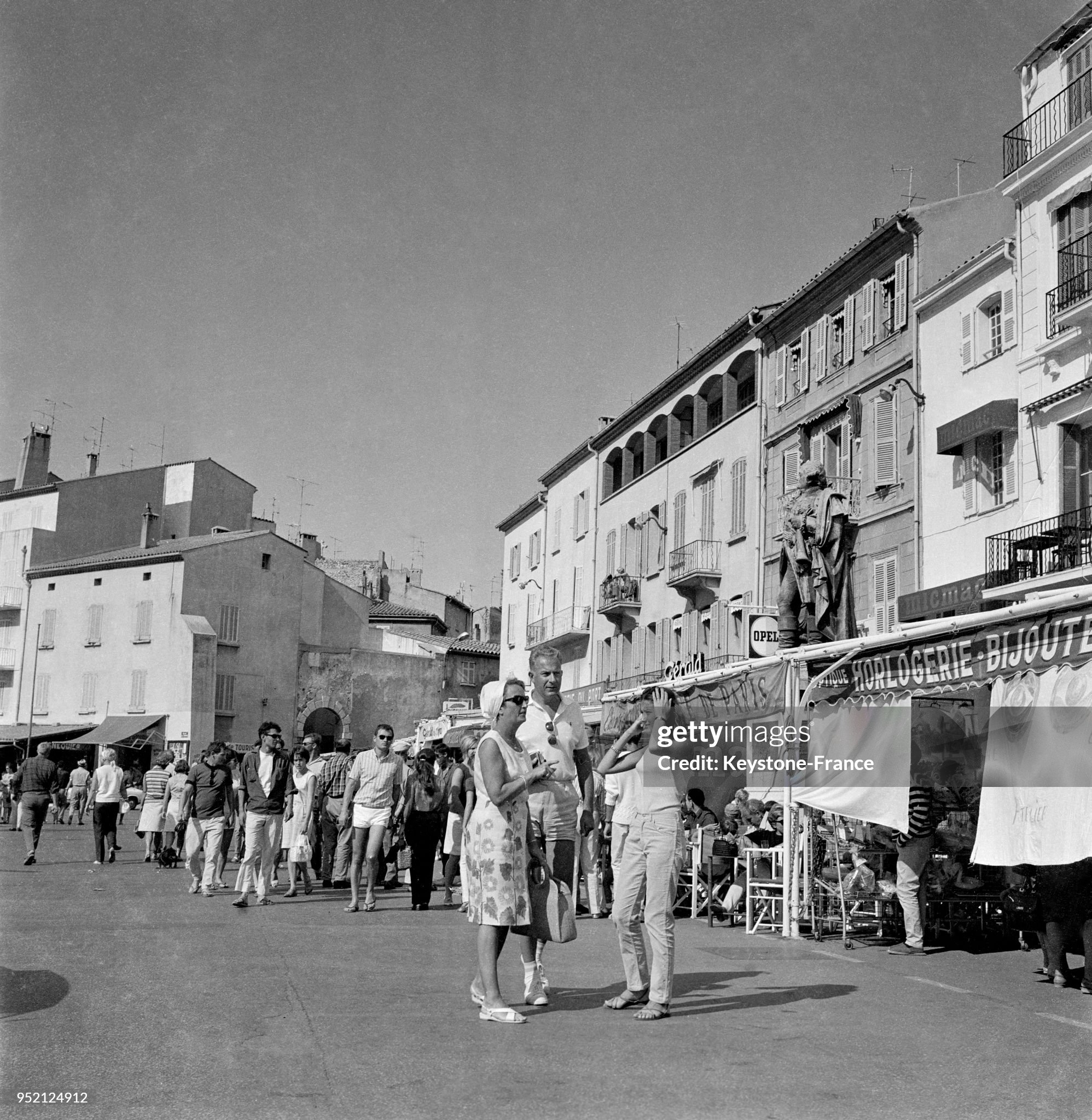 Street scene on the port of Saint-Tropez in 1950s. 