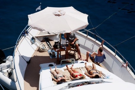 Sunbathers relax in the French Rivera sun while the F1 hits Monaco. 