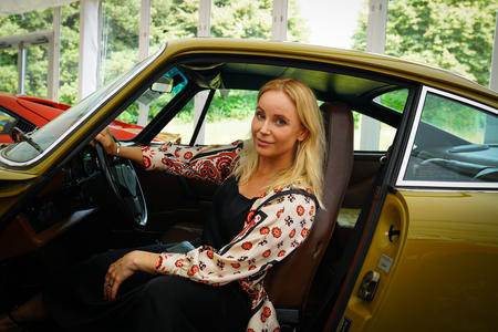 The Swedish actress Sofia Helin with Saga’s Porsche which was sold at auction for £125k.