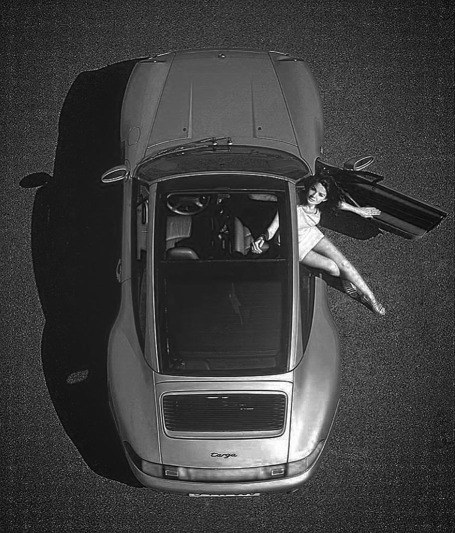 A girl in a Porsche 993 Targa.