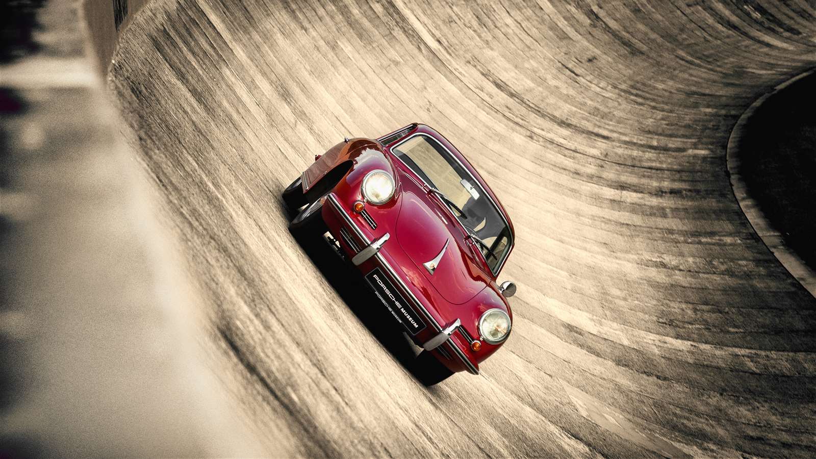 A red Porsche 356.