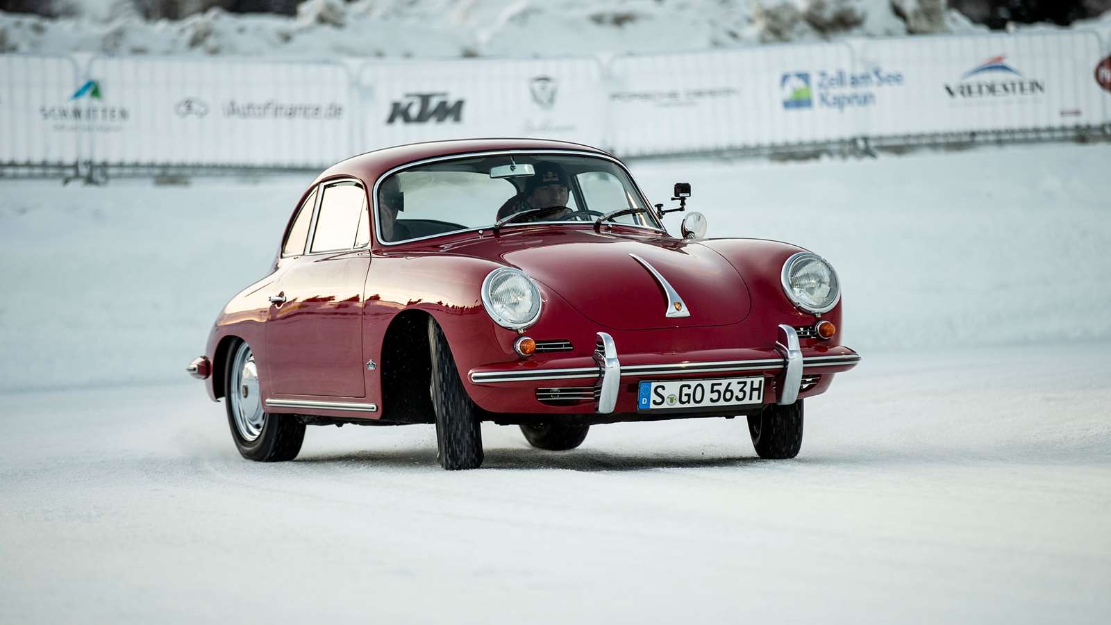 A red Porsche 356.