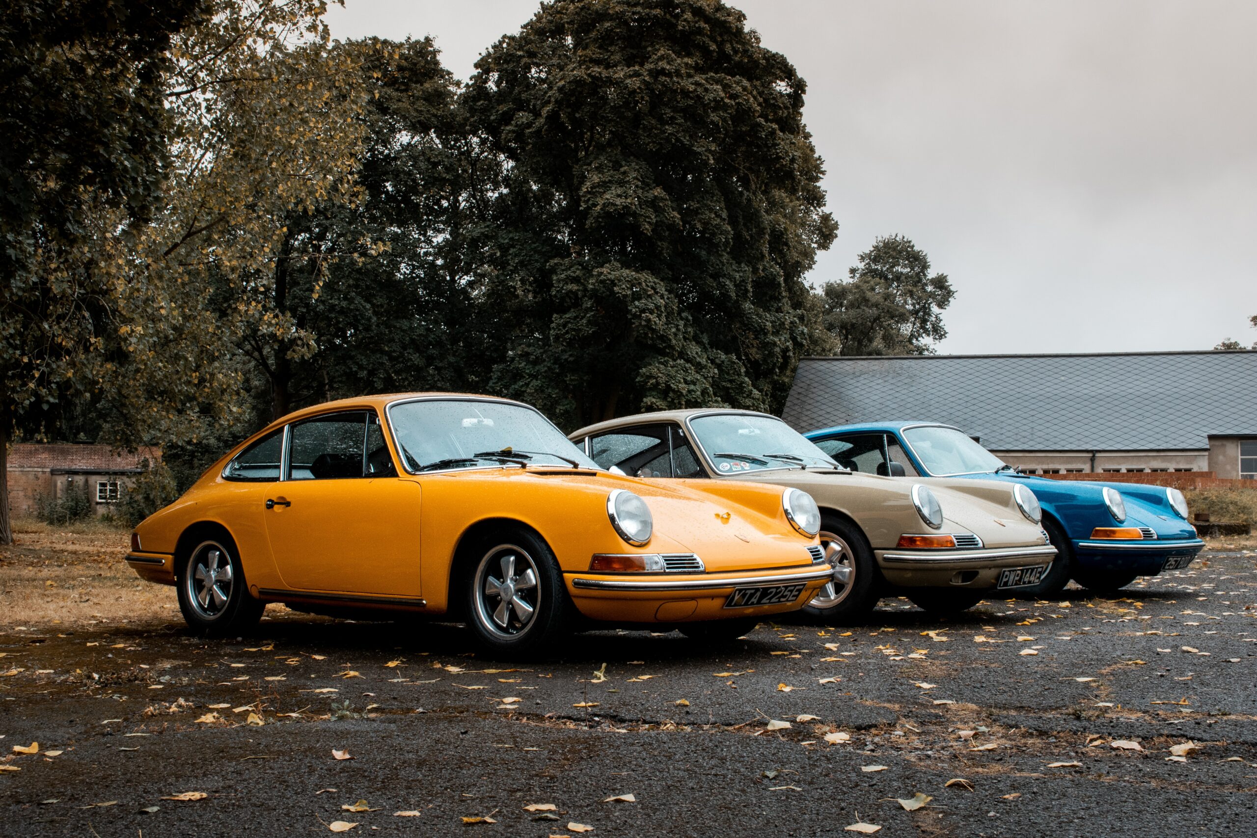 Three Porsches 911.